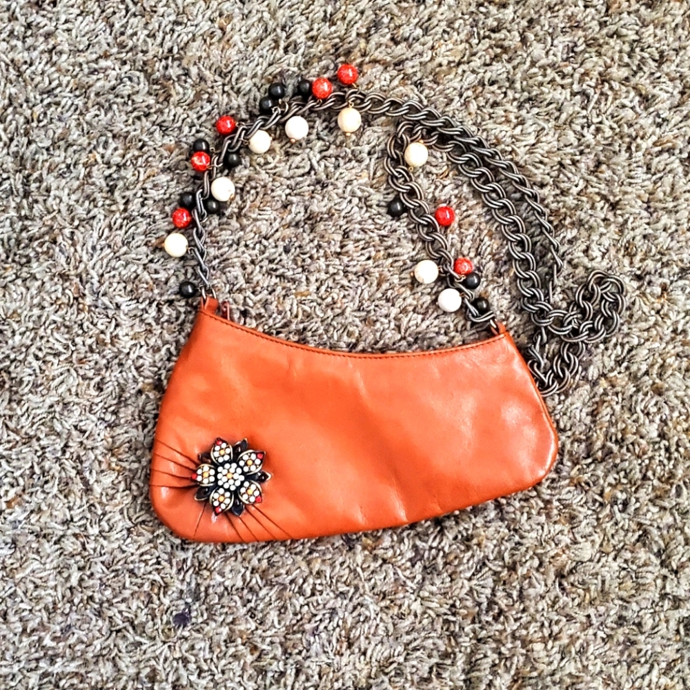 Liz Soto clutch with shoulder strap